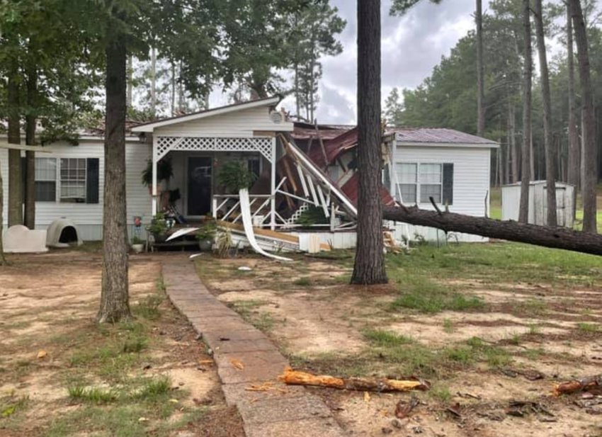 Pam Stokes Irons shared this photo where a tree fell on their home in the Bond community Monday during severe weather.